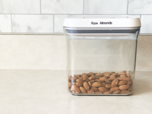 almonds in container with a label