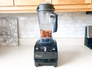 blender filled with almonds