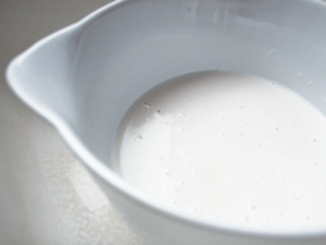 almond milk in a pouring bowl